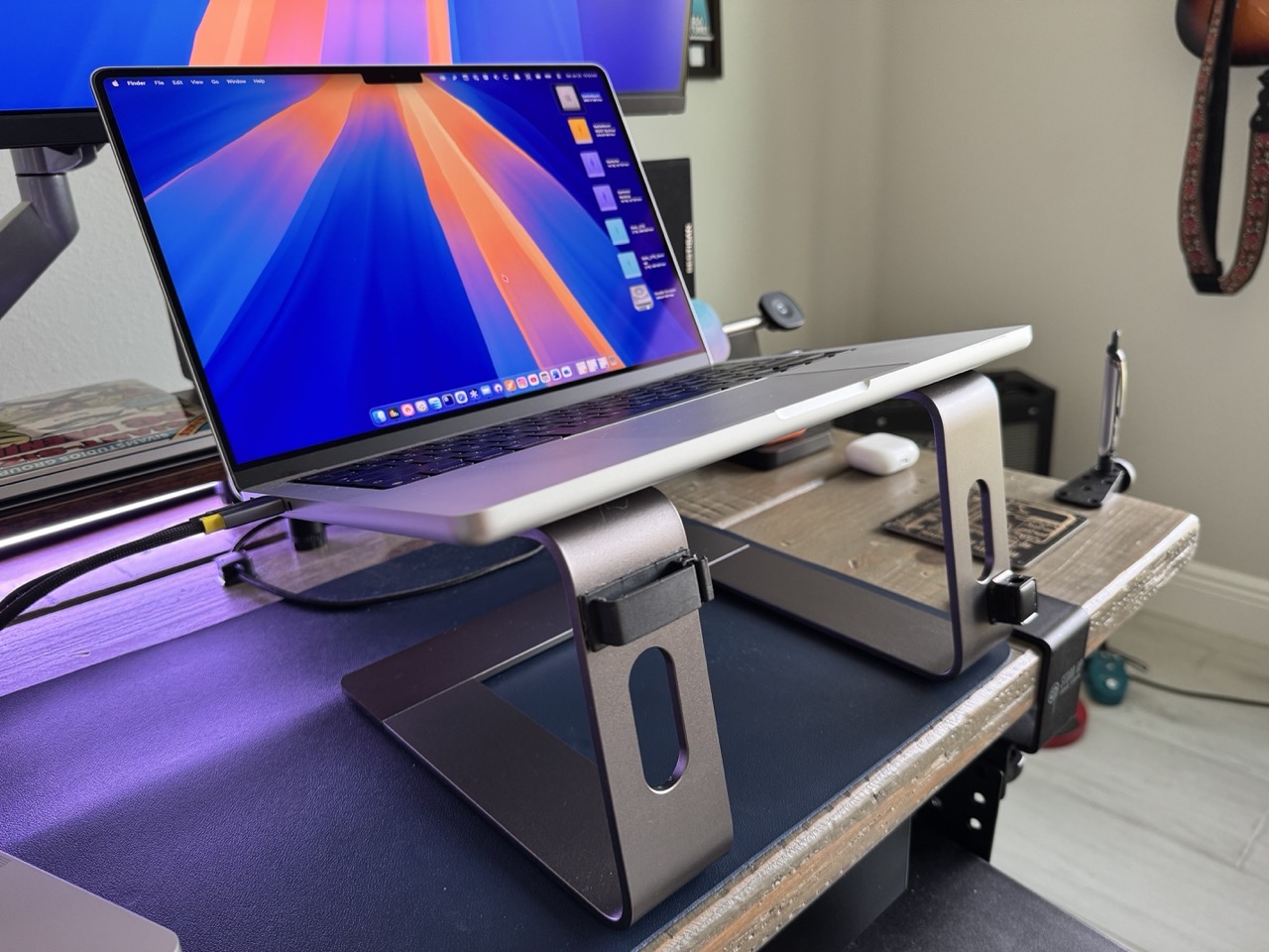 MBP on stand.